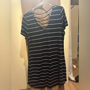Stripped t-shirt dress. Size medium. Super flattering with a flowy style.